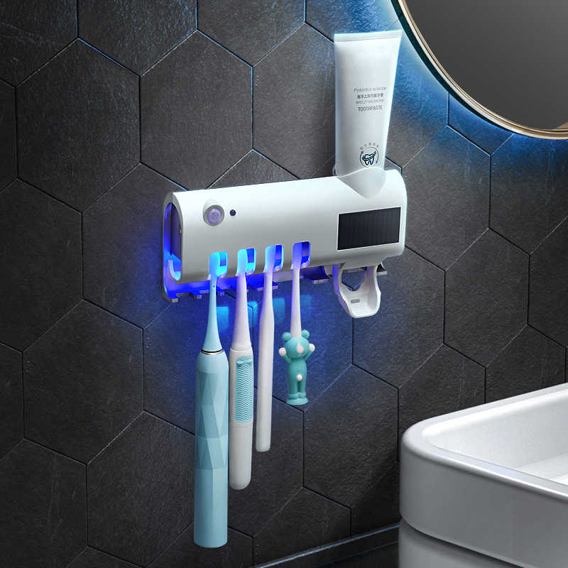 Dozator pentru pasta de dinti cu alimentare solara si sterilizator UV pentru periute